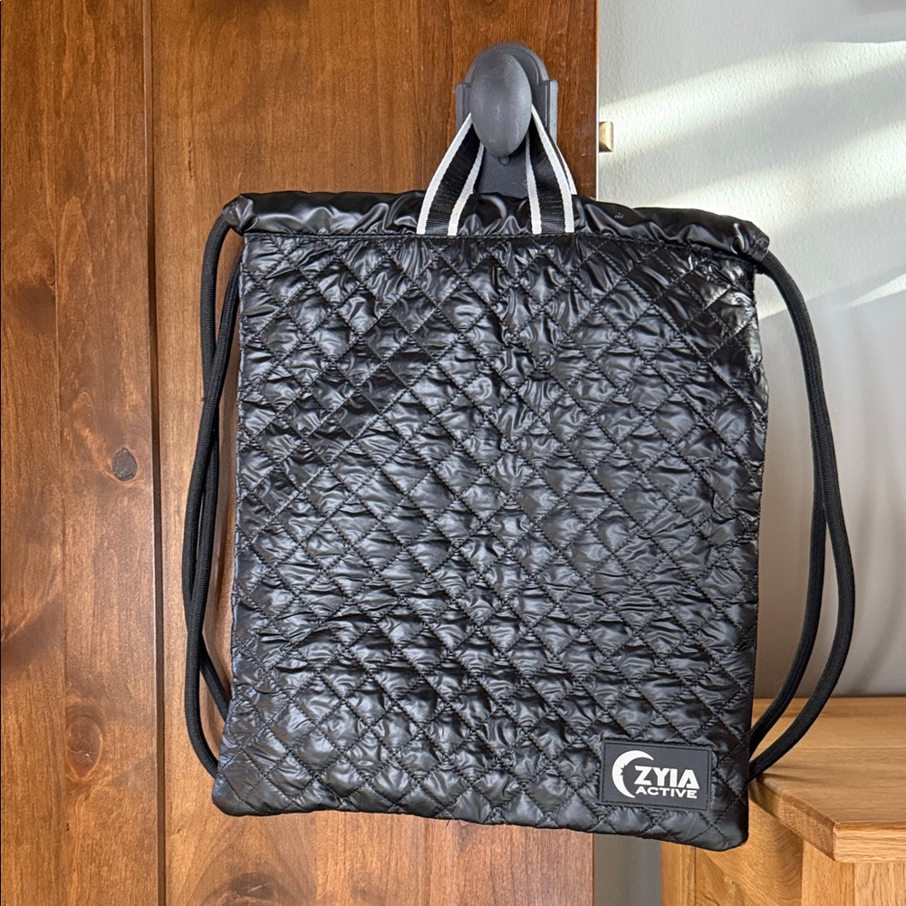 Limited edition Black Quilted Zyia drawstring cinch Backpack/Bag